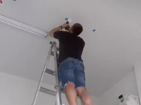 Drilling pilot holes in garage ceiling